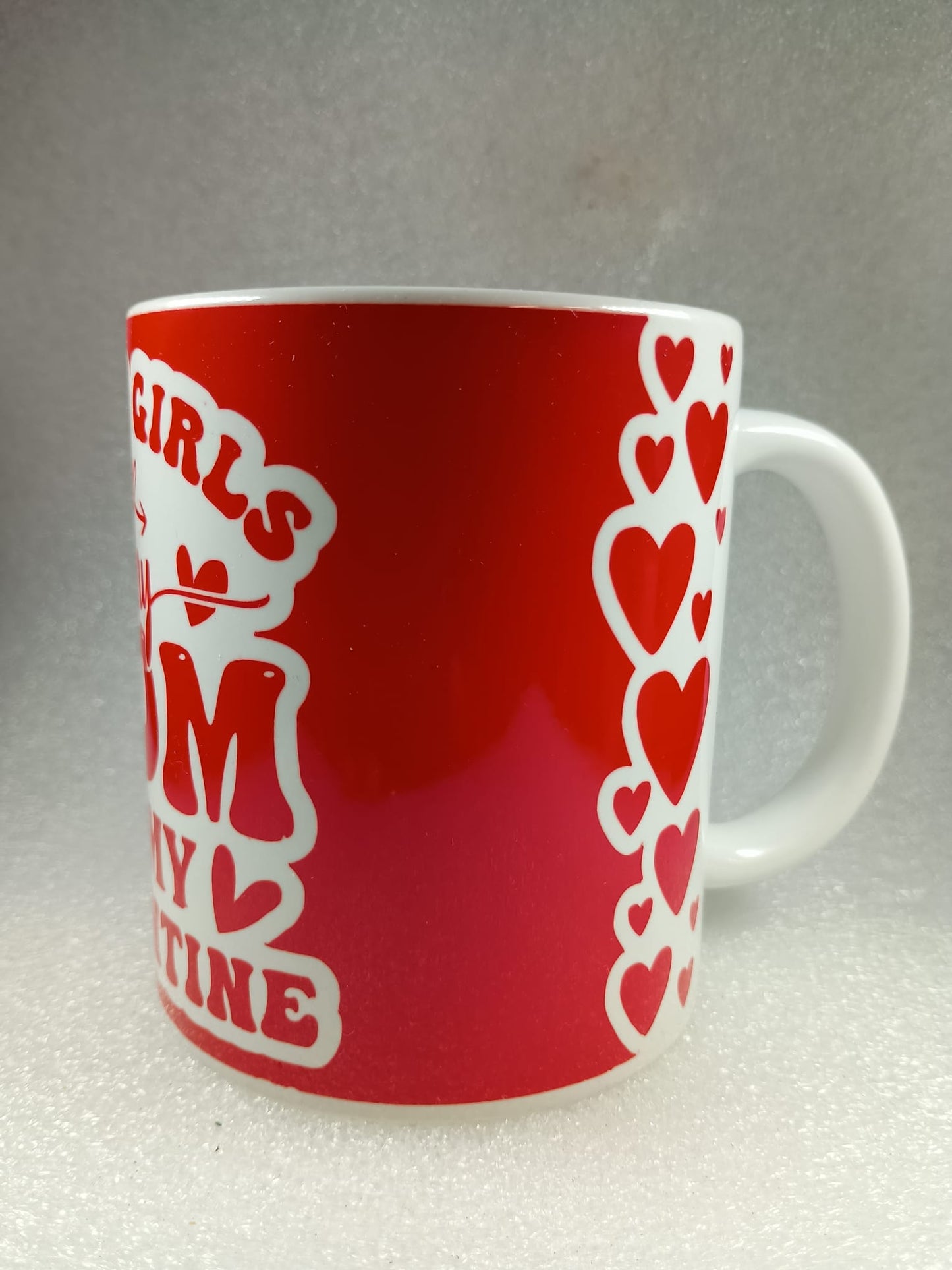 white mug with red print